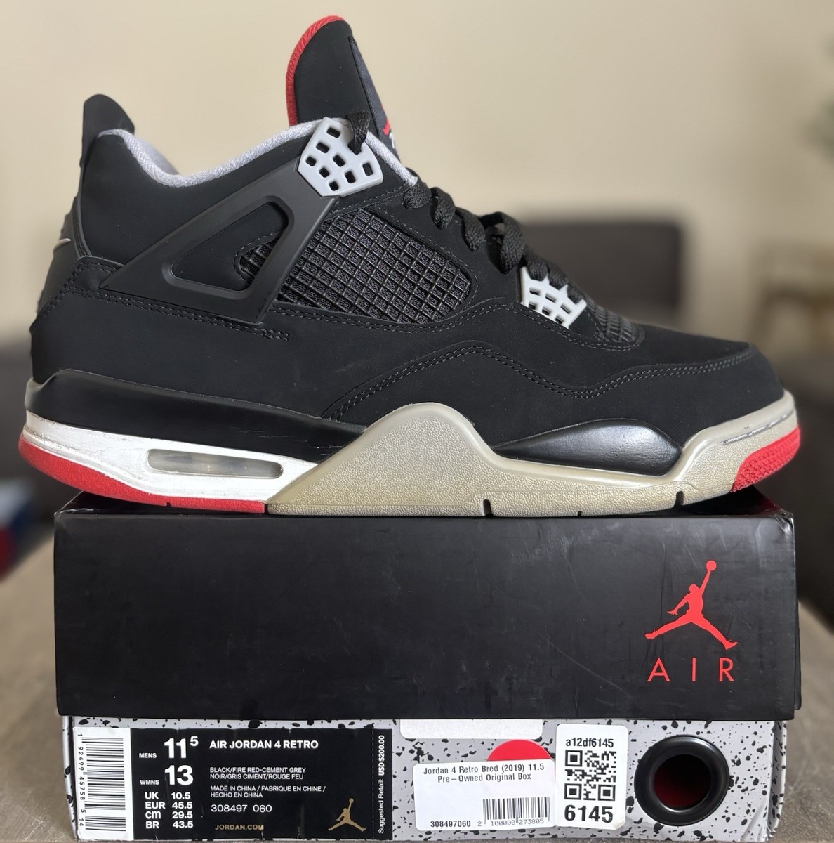 Size 11.5 - Nike Air Jordan 4 Retro Bred (2019) Black Cement  display picture 2