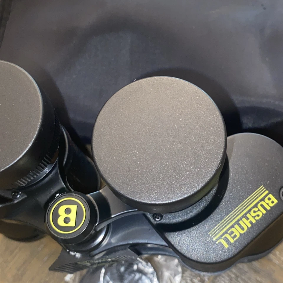 Binoculares Bushnell Insta Focus 7x35 420 pies 1000 yardas óptica recubierta con estuche Foto 2 de 4