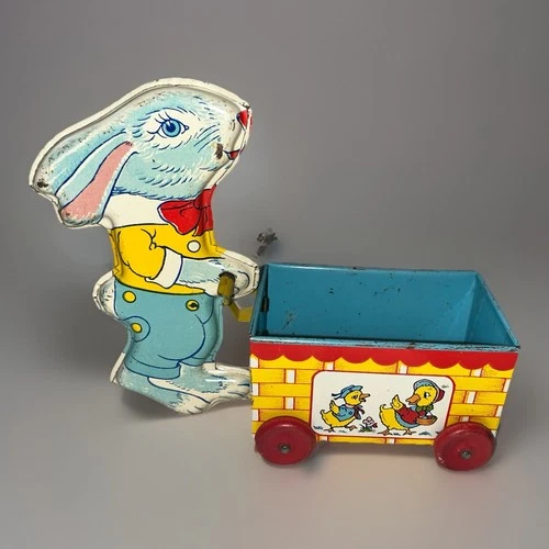 VINTAGE TIN LITHOGRAPH EASTER BUNNY PUSHING CART  J. CHEIN METAL TOY