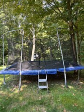 Used Skywalker 15X9 Foot Square Trampoline and Enclosure Combo Priced To Sell 