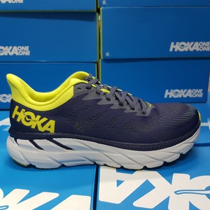 grey hoka shoes