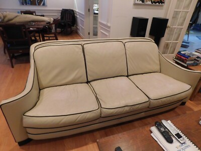 Elegant leather sofa and loveseat set from an estate on Connecticut's Gold Coast