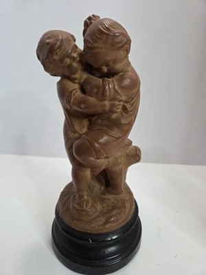 Brown Resin Stained People Figurine Two Children Embracing Sculpture