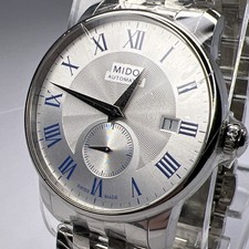 Reloj Mido 38 mm Acero Automático Fecha Esfera Plateada Azul Números Romanos con Caja
