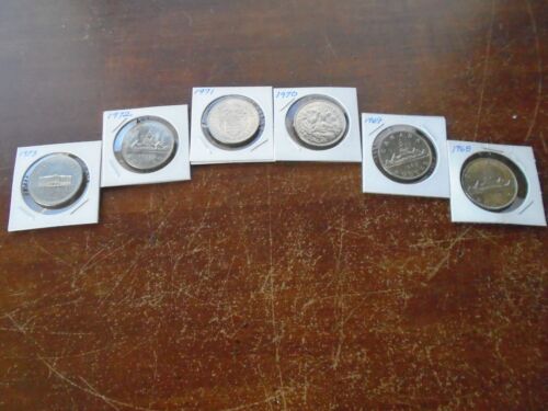 Uncirculated lot of 6 Canadian Dollars from 1968 through 1973.