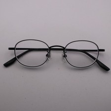Used Unbranded Black Oval Titanium Eyeglasses Frames, Sold as Frames Only