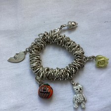 Vintage Charm bracelet with 5 charms Pumpkin Acorn Teddy half Heart Flower