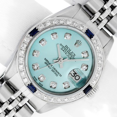 ROLEX LADIES DATEJUST STEEL AND 18K GOLD WITH ICE BLUE DIAMOND BEZEL WATCH