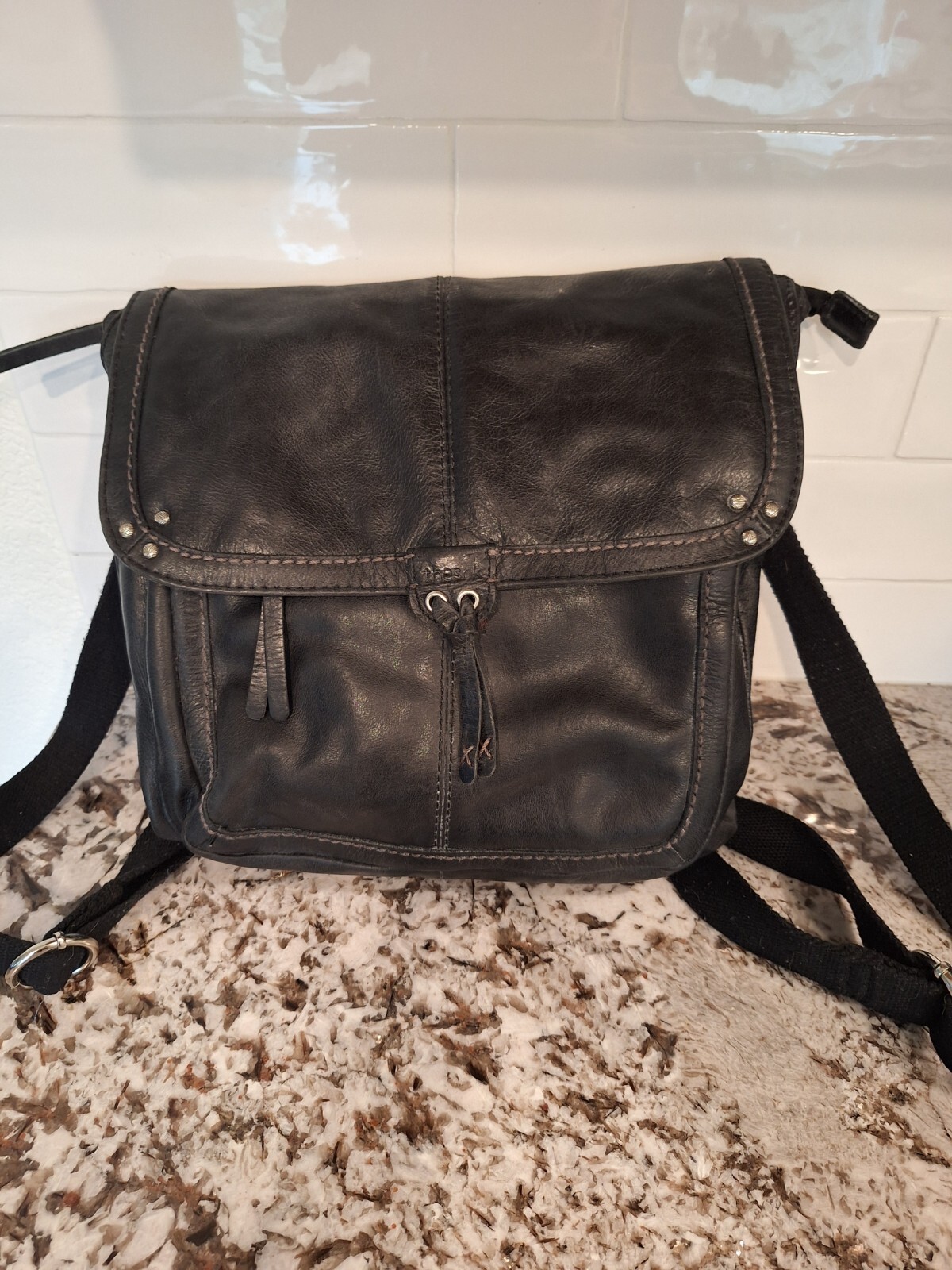 The Sak Ventura Distressed Black Leather Convertible Backpack Crossbody Bag