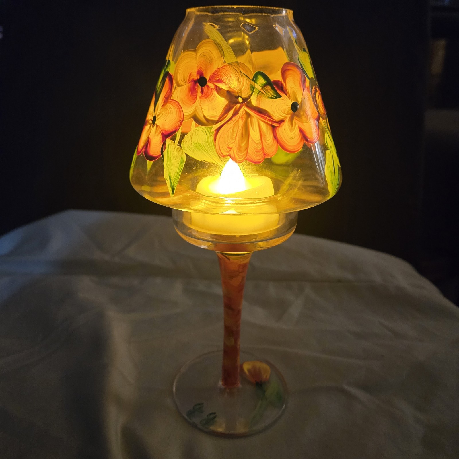 With Floral Motifs And A Swirled Stem.