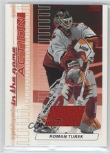 2003-04 ITG Action Game-Used Jerseys Ruby /500 Roman Turek #M-85 1o3