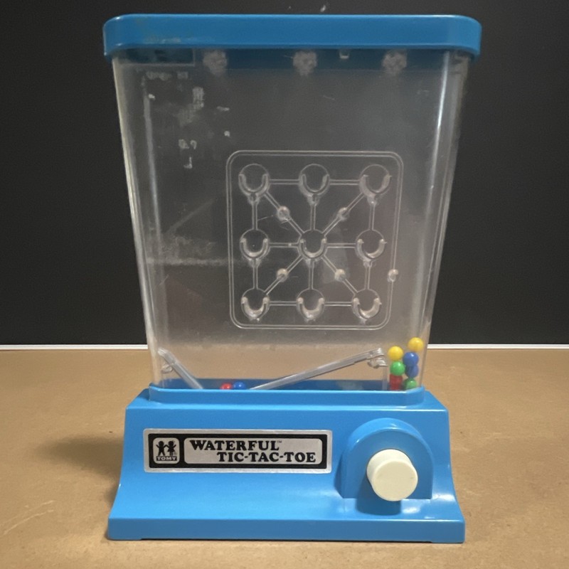 TOMY Waterful Tic-Tac-Toe Skill & Action Water Game Blue, Ages 4-7