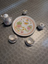 Mini Tea Set Girl Playing with Her Toys 10 Piece Assorted Porcelain