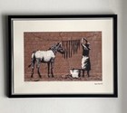 lithographie banksy avec certificat et encadrée