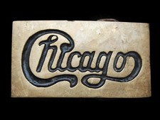 MI29174 VINTAGE 1978  CHICAGO  BAND SOLID BRASS MUSIC BELT BUCKLE