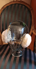 Plush white faux fur earmuffs with sparkle band