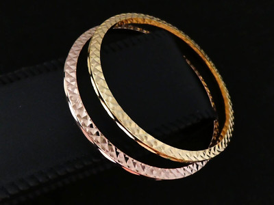 SCHÖNE x2 goldfarbene & roségoldfarbene stark facettierte funkelnde Metall ARMREIFEN sehr guter Zustand
