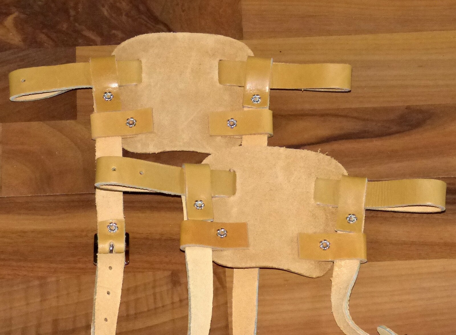 Brand new pair of tan colored leather bindings for snowshoes