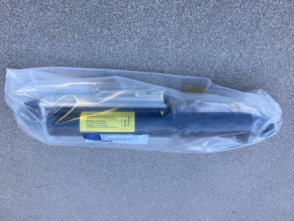 Genuine Mercedes 2308600335 Convertible Left Lock Pawl Cylinder Support R230 SL - Image 2 of 3