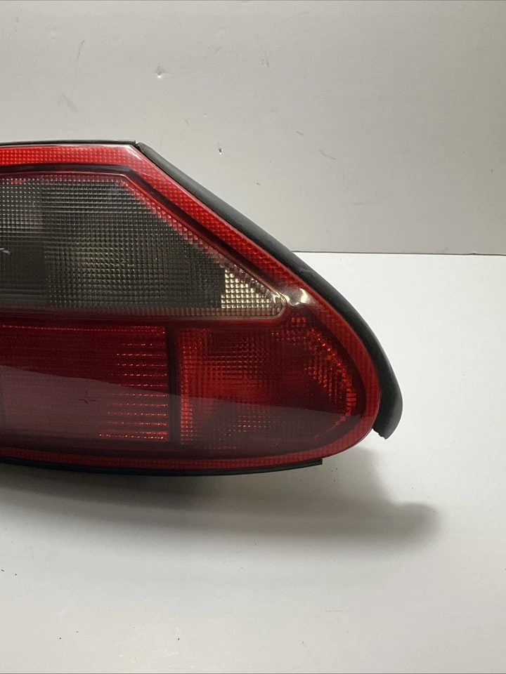 Conjunto de luz trasera exterior lado conductor izquierdo Jaguar XK8 XKR 1997-2000 FABRICANTE DE EQUIPOS ORIGINALES CON BOMBILLA Foto 2 de 4