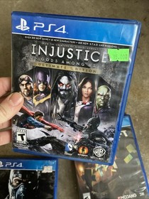 PS4 Video Game Lot 4 Wolfenstein 2,jurassic World,mortal Kombat Injustice D4