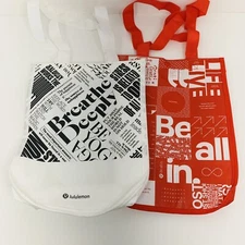 2 lululemon shopping bags reusable 1 White- 1 Red , 12” X 9”