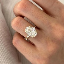 5 Carat Oval E VS1 Lab Grown Diamond Hidden Halo Engagement Ring in Yellow Gold