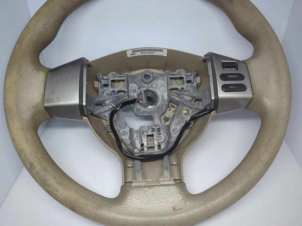 Volante Nissan Versa 2007-2011 con control de crucero grado C bronceado Foto 3 de 4