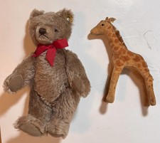 Vintage Steiff Bear 10" and Giraffe 7" both have button with yellow tag.