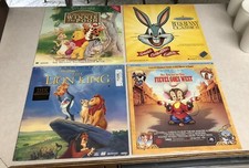 4 Laserdiscs The Lion King Bugs Bunny An American Tale Winnie The Pooh