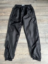 Karl Kani Deportivo Cortavientos Chándal Jogger Pantalones Bolsillos Negro Talla M