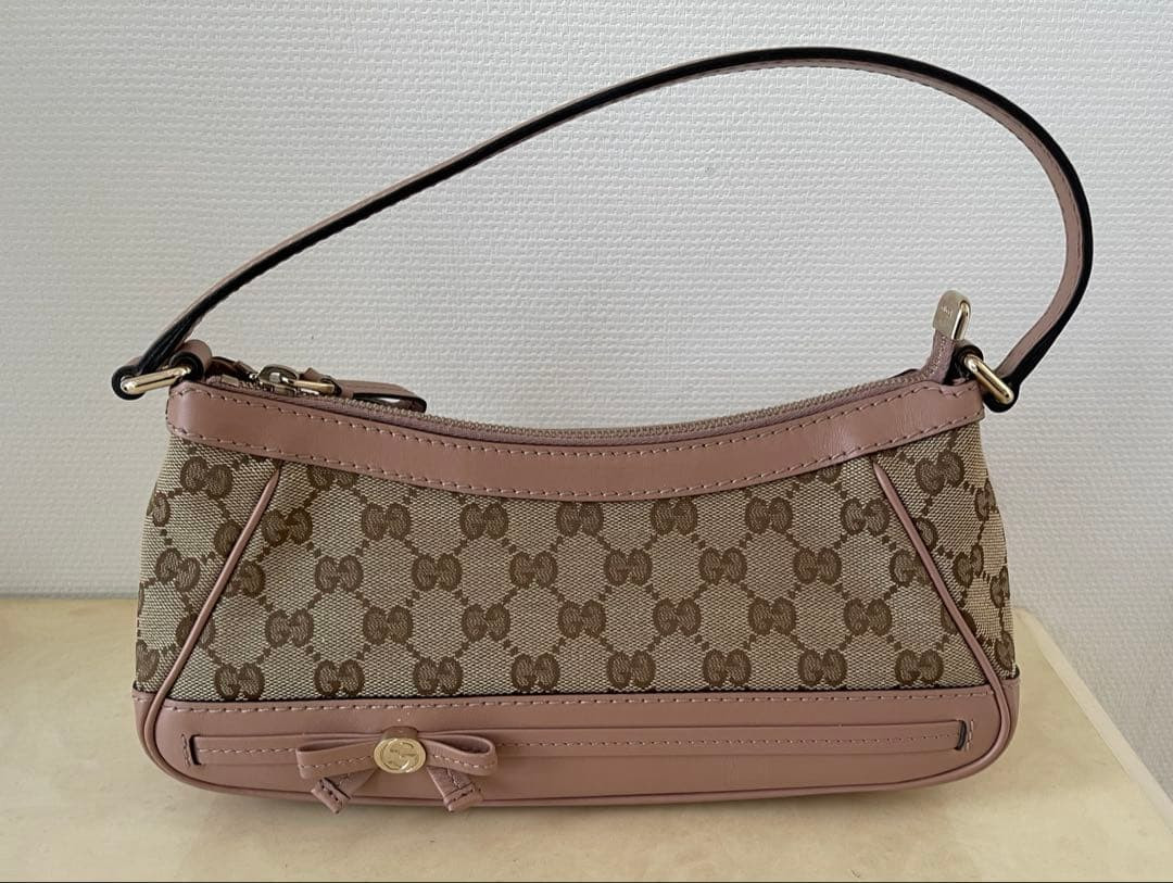 Borsa Gucci Mayfair semi tracolla beige GG tela pelle rosa punto marsupio
