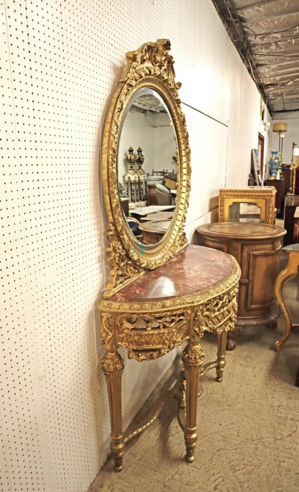 Consola superior de mármol estilo francés intrincadamente decorada con espejo Foto 4 de 4