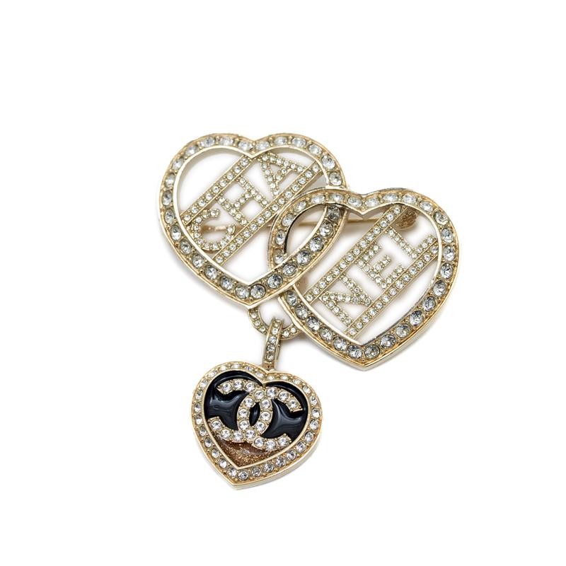 CHANEL Coco Mark Triple Heart Rhinestone Brooch in Gold & Black Authentic Luxury