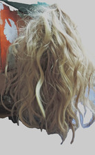 So easy. Pull back your hair and clip in this pony