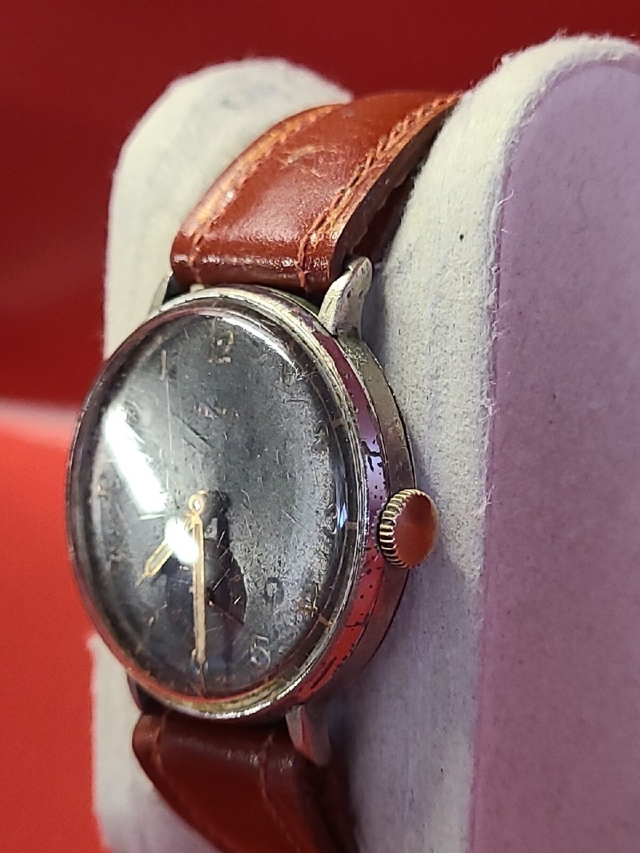 Montre Ancienne OLMA Pour Homme – Style Militaire Swiss Made – Mouvement Mécanique Manuel – Occasion Portée