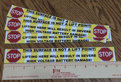 Mach-E Warning Decals To Prevent Improper Vehicle Lifting