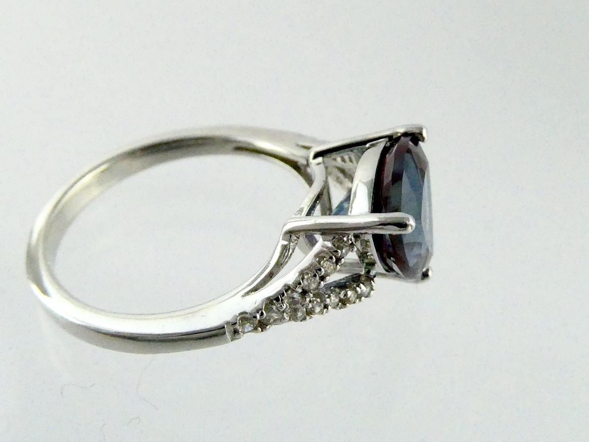 DK Color Change Lab Created Sapphire and Zircon Halo Ring DK Color Change Lab Created Sapphire and Zircon Halo Ring