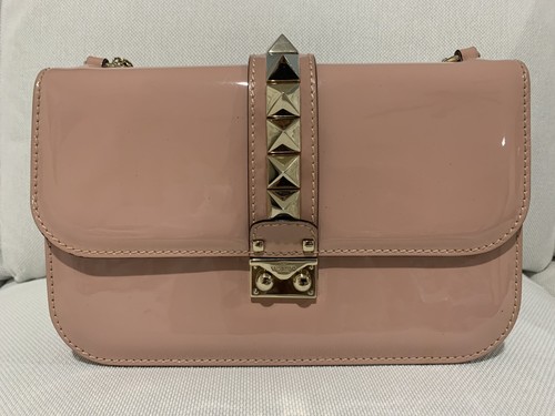 blush patent handbag