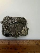 VINTAGE THE GREAT AMERICAN BUCKLE CO 1982 COUNTRY MUSIC BUCKLE