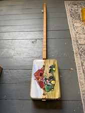 John Deere memorabilia cigar box tin guitar single string folk art