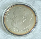 8 Troy ounces Roosevelt Dime, .999 silver,  3.5 in diameter.