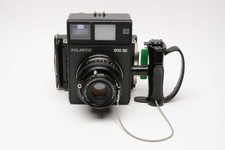 Polaroid 600SE Instant Camera w/Mamiya 127mm F4.7, New seals 