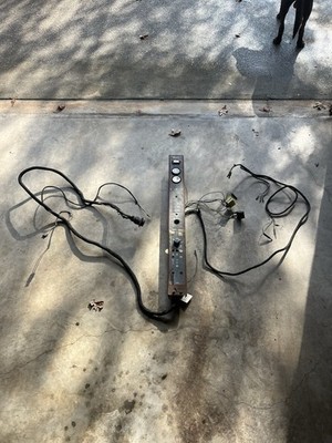 Front wiring harness and gauge pillar for a 5635 or 6635 GEHL skid steer