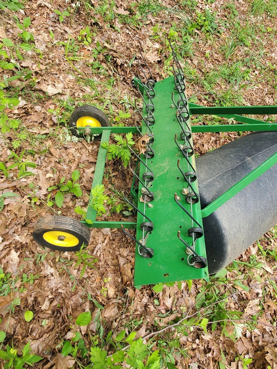 John deere tow behind aerator outlet