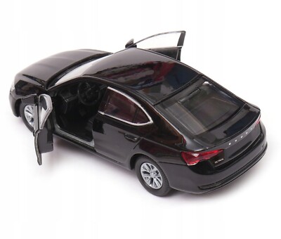 Mașină de jucărie metalică Skoda Octavia Welly, 1:34, alb, 12x3, 5x4, 5cm