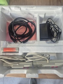 Amstrad GX 4000 Games Console With Controllers And Burnin Rubber Game