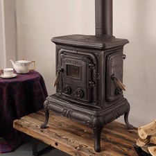 Ancien poêle à bois en fonte - brûleur à bûches intérieur rustique autoportan...