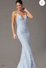 Gorgeous long, embroidered , open back prom dresses size 2 never warn with tags.