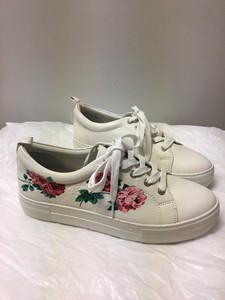 j slides white sneakers